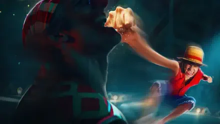 One Piece (Live Action) 4K Ultra HD desktop wallpaper: Luffy in a straw hat stretches his arm to punch a shadowy foe amid dynamic motion blur.