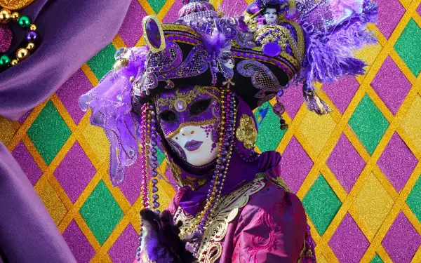 A vibrant Mardi Gras festival scene featuring a masked individual adorned in elaborate purple and gold attire, set against a colorful diamond-patterned background.