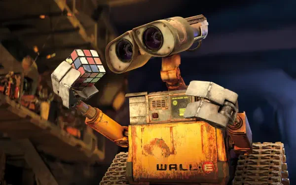 Wall·E, the beloved character from Pixar, holds a Rubik's Cube in this HD desktop wallpaper, showcasing his charming and curious personality against a detailed background.