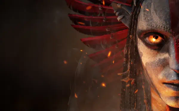 4K Ultra HD PC desktop wallpaper featuring a close-up of a fiery, intense avatar face with glowing orange eyes and ash-like texture from Fire and Ash.