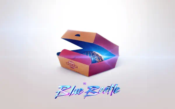 4K Ultra HD PC desktop wallpaper of Blue Beetle: a neon pink-and-orange open box reveals a glowing blue orb, with stylized Blue Beetle script on a soft white gradient background.