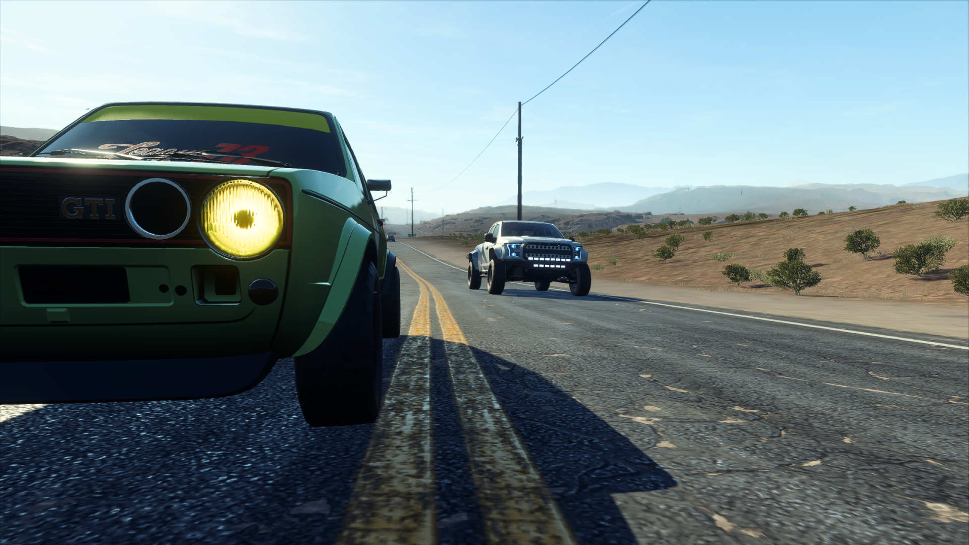Need for Speed Heat HD PC desktop wallpaper: green VW GTI close-up and blue Raptor racing down a sunlit desert highway background.