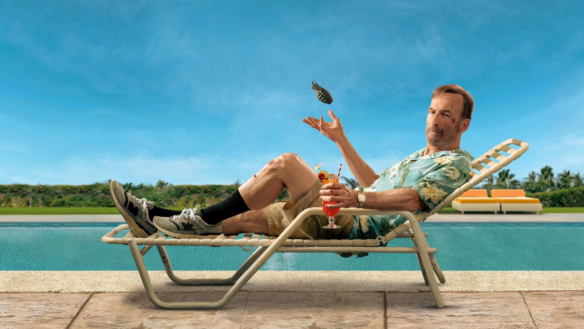 Nobody 2 — a man in a Hawaiian shirt lounges on a poolside chaise, tossing a handgun, drink beside him, pool and blue sky behind. 4K Ultra HD PC desktop wallpaper/background
