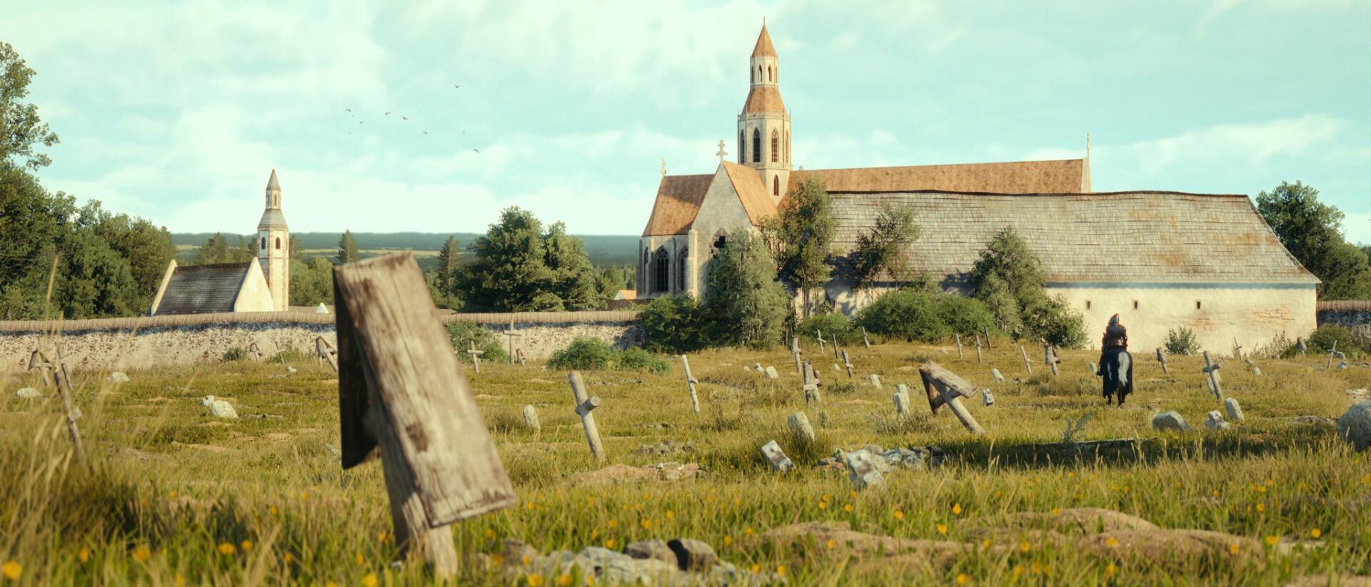 HD PC desktop wallpaper from the video game Kingdom Come: Deliverance II showing a sunlit countryside cemetery with weathered grave markers and a stone church on the horizon.