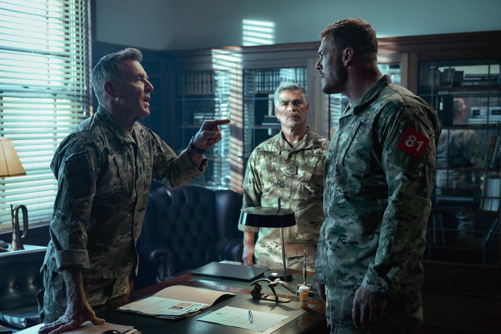 War Machine (2026) movie scene: three uniformed officers in a heated argument across a cluttered office — 5K Ultra HD PC desktop wallpaper/background.