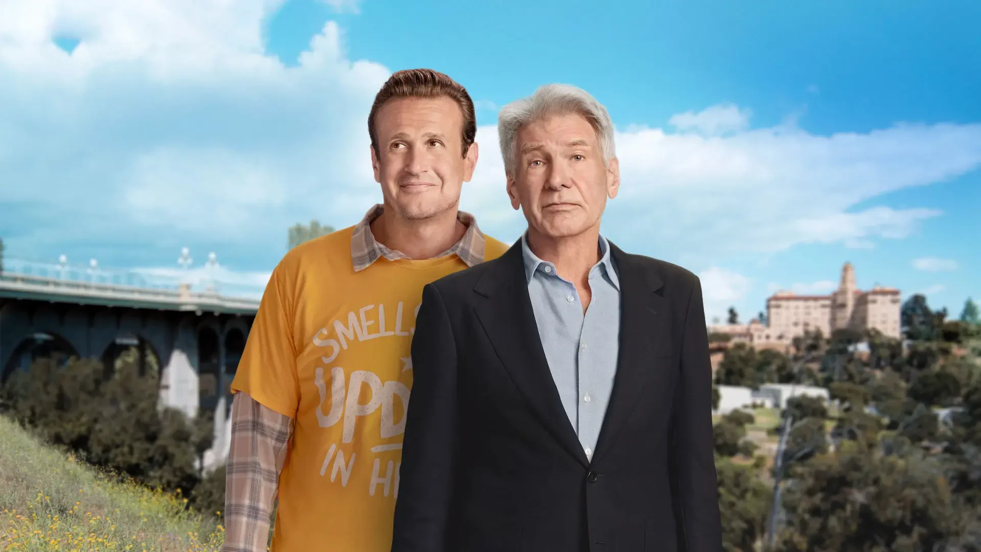 Shrinking — two men stand before a sunny hillside and bridge, one in a yellow T-shirt and one in a dark suit. 4K Ultra HD PC desktop wallpaper and background.