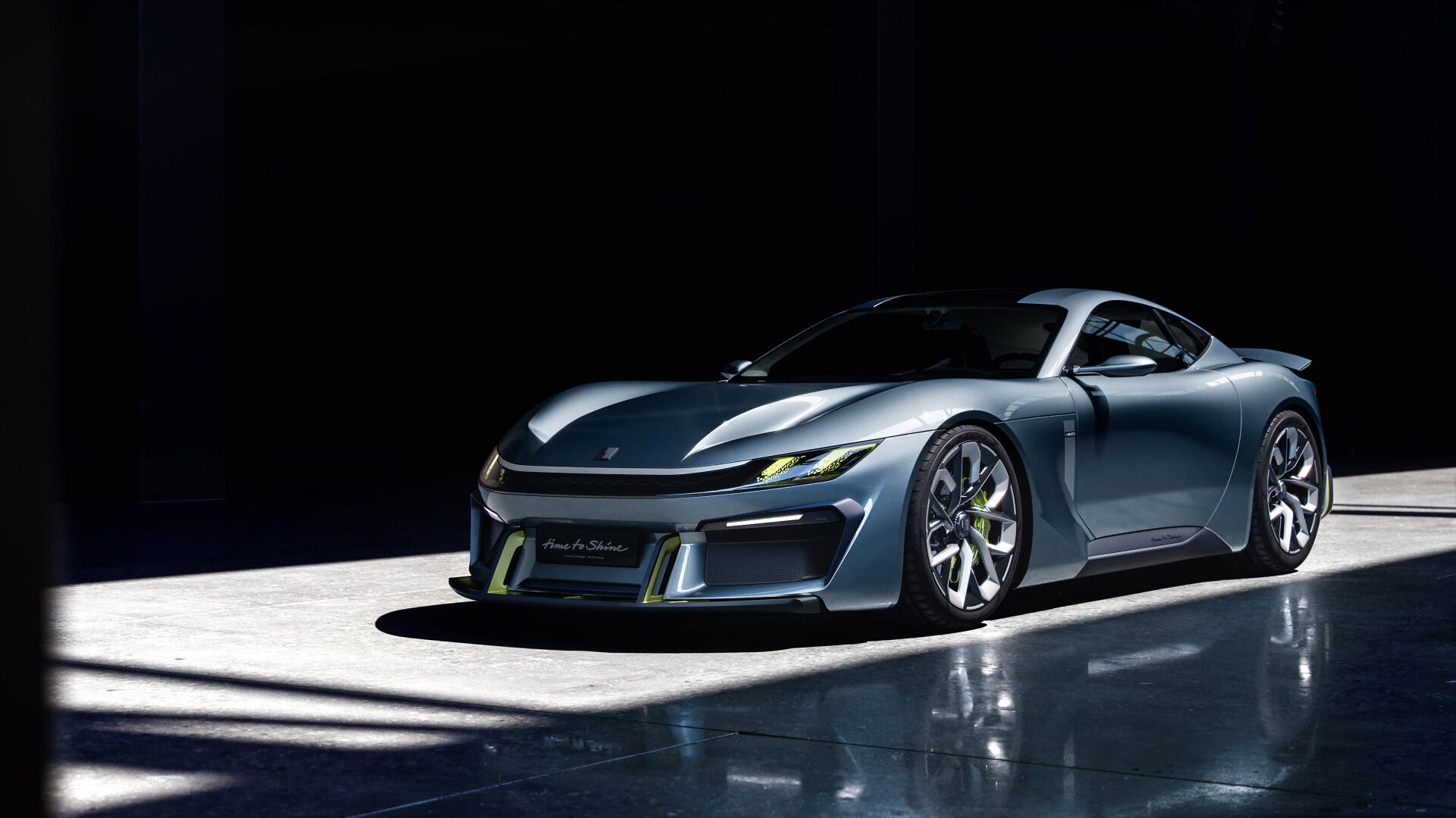 Lynk & Co GT car/vehicle on a reflective floor under dramatic studio lighting — 4K Ultra HD PC desktop wallpaper and background.