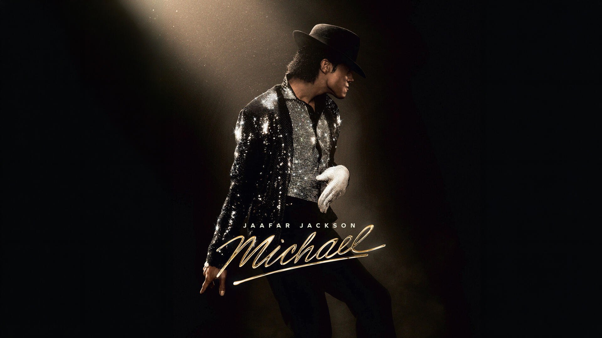8K Ultra HD PC desktop wallpaper titled Michael (2026) — silhouetted sequined performer in a fedora and single white glove striking a pose beneath a dramatic spotlight.
