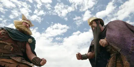 TV show One Piece (Live Action) 2K Quad HD PC wallpaper: giants Dorry and Brogy face off under a bright, cloud-dotted sky.