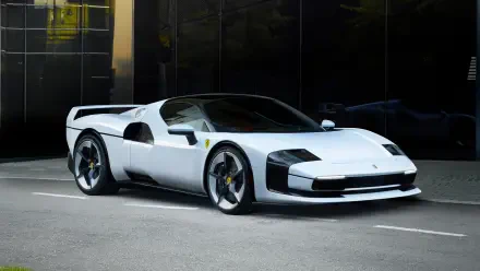 White Ferrari SC40 sports car parked before a dark glass facade, rendered as a 4K Ultra HD PC desktop wallpaper and background.