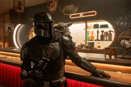 The Mandalorian (character) leans at a dim cantina bar with Grogu (Star Wars) on his shoulder — 8K Ultra HD PC desktop wallpaper/background from the TV show The Mandalorian