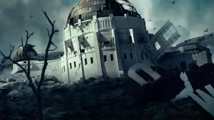 Greenland 2: Migration — 5K Ultra HD PC desktop wallpaper showing a shattered domed building in a cold, ruined landscape with collapsed structures and circling birds.