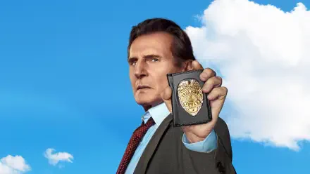 The Naked Gun 4K Ultra HD PC desktop wallpaper: a stern suited cop holds a badge toward the viewer against a bright blue sky dotted with white clouds.