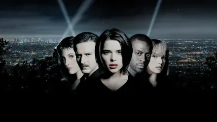 Scream 3 4K Ultra HD PC desktop wallpaper: five shadowed faces in a row above a nighttime city skyline with searchlights, moody blue-gray tones and ominous atmosphere.