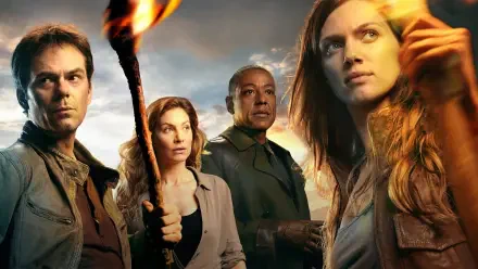 HD PC desktop wallpaper background of Revolution (TV show): four survivors holding torches at dusk, tense post‑apocalyptic atmosphere.