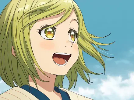 HD PC desktop wallpaper showing Coco from Witch Hat Atelier — an anime close-up of her smiling with windblown hair against a bright blue sky.