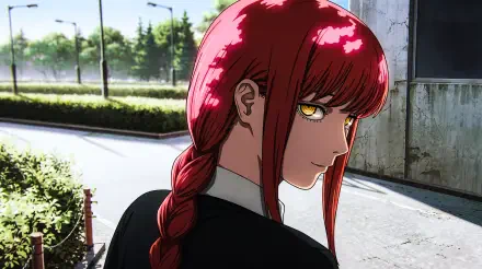5K desktop wallpaper of Makima (Chainsaw Man): red-haired braided anime woman with glowing yellow eyes and a sinister, devilish stare on a sunlit urban street.