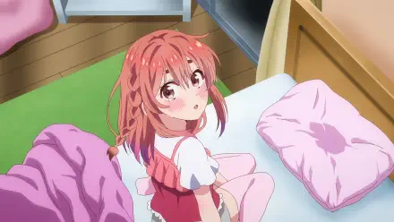 HD PC desktop wallpaper of Sumi Sakurasawa from Rent-A-Girlfriend: anime scene of her sitting on a bed, pink braided hair, looking up with a shy, gentle expression