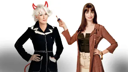 The Devil Wears Prada 4K Ultra HD PC desktop wallpaper: two fashion-forward women on white background — a white-haired figure with red devil horns and tail in black, and a brunette holding red lipstick.