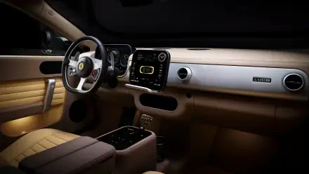 Ferrari Luce interior: tan leather cabin, detailed dashboard and steering wheel, photographed in 4K Ultra HD — PC desktop wallpaper/background.