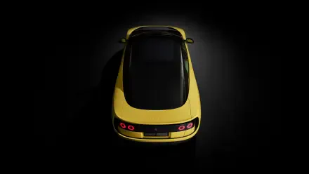 Top-down view of a yellow Ferrari Luce vehicle against a dark backdrop, rendered as a 4K Ultra HD PC desktop wallpaper and background.