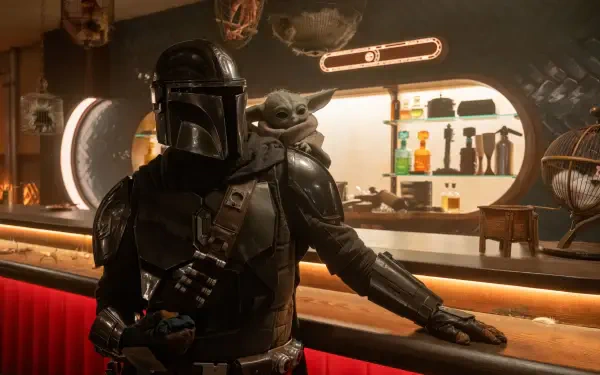 The Mandalorian (character) leans at a dim cantina bar with Grogu (Star Wars) on his shoulder — 8K Ultra HD PC desktop wallpaper/background from the TV show The Mandalorian