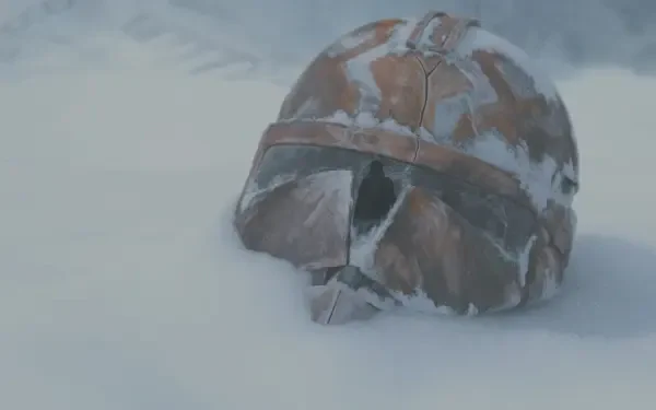 Star Wars: The Clone Wars (2008) 2K Quad HD PC desktop wallpaper — a worn clone trooper helmet half-buried in snow beneath a pale, cloudy sky.