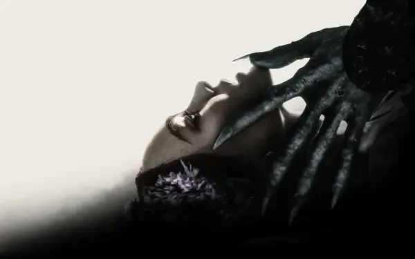 Nosferatu (2024) 4K Ultra HD PC desktop wallpaper and background: shadowed vampire with elongated fingers and a pale face against a stark light-and-dark backdrop.