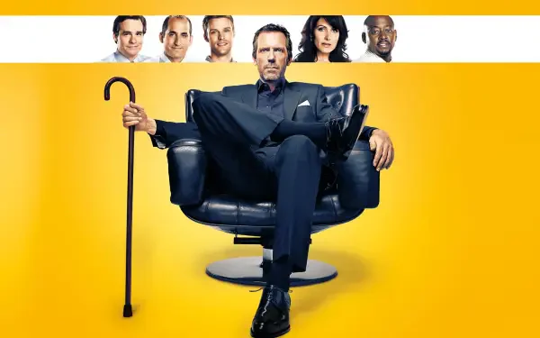 4K Ultra HD PC desktop wallpaper of TV doctor Dr. House seated in a black armchair holding a cane on a bright yellow background, with small cast headshots in a white strip above.