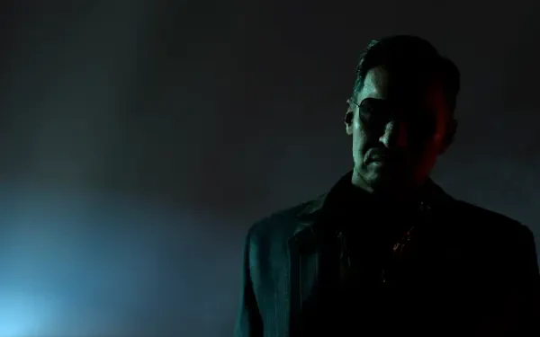 4K Ultra HD PC desktop wallpaper and background: a shadowed yakuza from Like a Dragon Gaiden — The Man Who Erased His Name, high-contrast lighting with drifting smoke framing his silhouette.