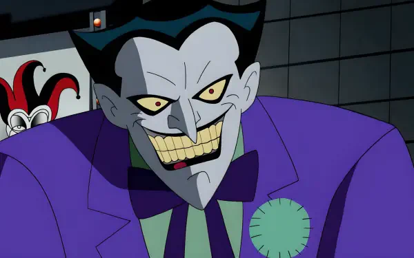 HD Justice League Unlimited desktop wallpaper: Joker grinning maniacally in a 2000s dark aesthetic, purple suit and yellow teeth, animated villain before a tiled background.