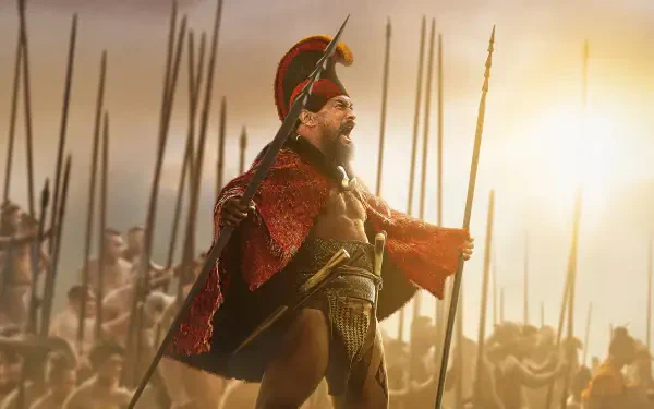 Chief of War: armored war chief in red cloak and plumed helmet leads a phalanx of spear-wielding soldiers at sunrise — dramatic 4K Ultra HD PC desktop wallpaper background.