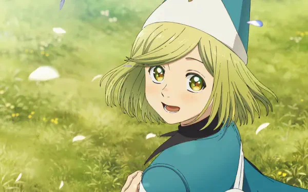 HD PC desktop wallpaper of Coco (Witch Hat Atelier): anime-style portrait of her smiling in a sunlit grassy field, wearing a blue witch hat and cloak with petals drifting around.