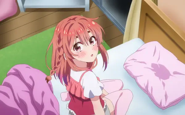 HD PC desktop wallpaper of Sumi Sakurasawa from Rent-A-Girlfriend: anime scene of her sitting on a bed, pink braided hair, looking up with a shy, gentle expression