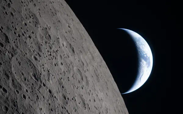 4K Ultra HD PC wallpaper: cratered Moon in foreground with crescent Earth from space, Artemis II.