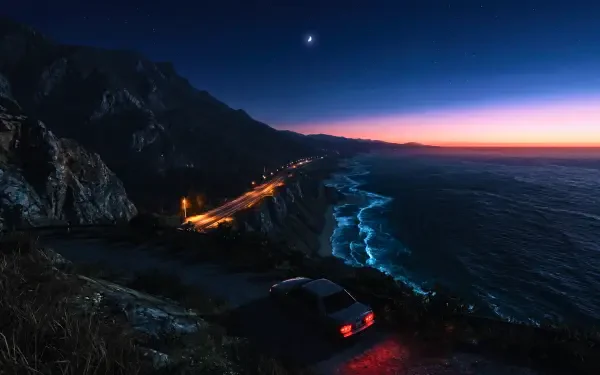 Grand Theft Auto–style 90s aesthetic 5K Ultra HD PC desktop wallpaper and background: lone car on oceanside highway during a sunset drive, neon-lit coastline and distant city lights.