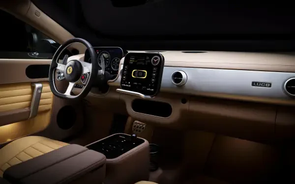 Ferrari Luce interior: tan leather cabin, detailed dashboard and steering wheel, photographed in 4K Ultra HD — PC desktop wallpaper/background.