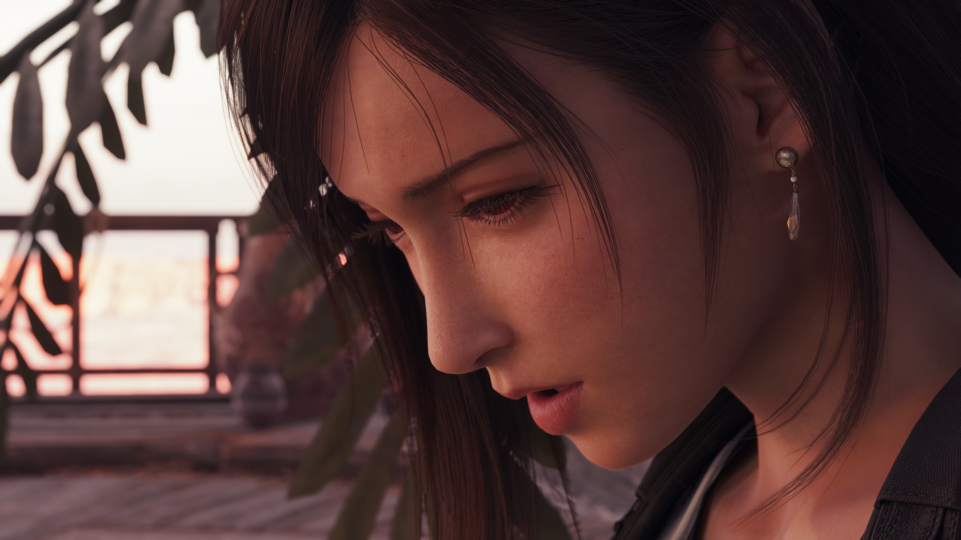 Close-up portrait of a contemplative character from Final Fantasy VII Rebirth, rendered as a 4K Ultra HD PC desktop wallpaper with warm sunset lighting.