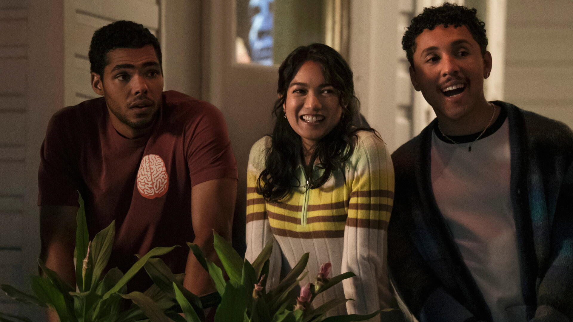 4K Ultra HD PC desktop wallpaper: three smiling people leaning over an interior railing in a warm, candid still from The Love Hypothesis.