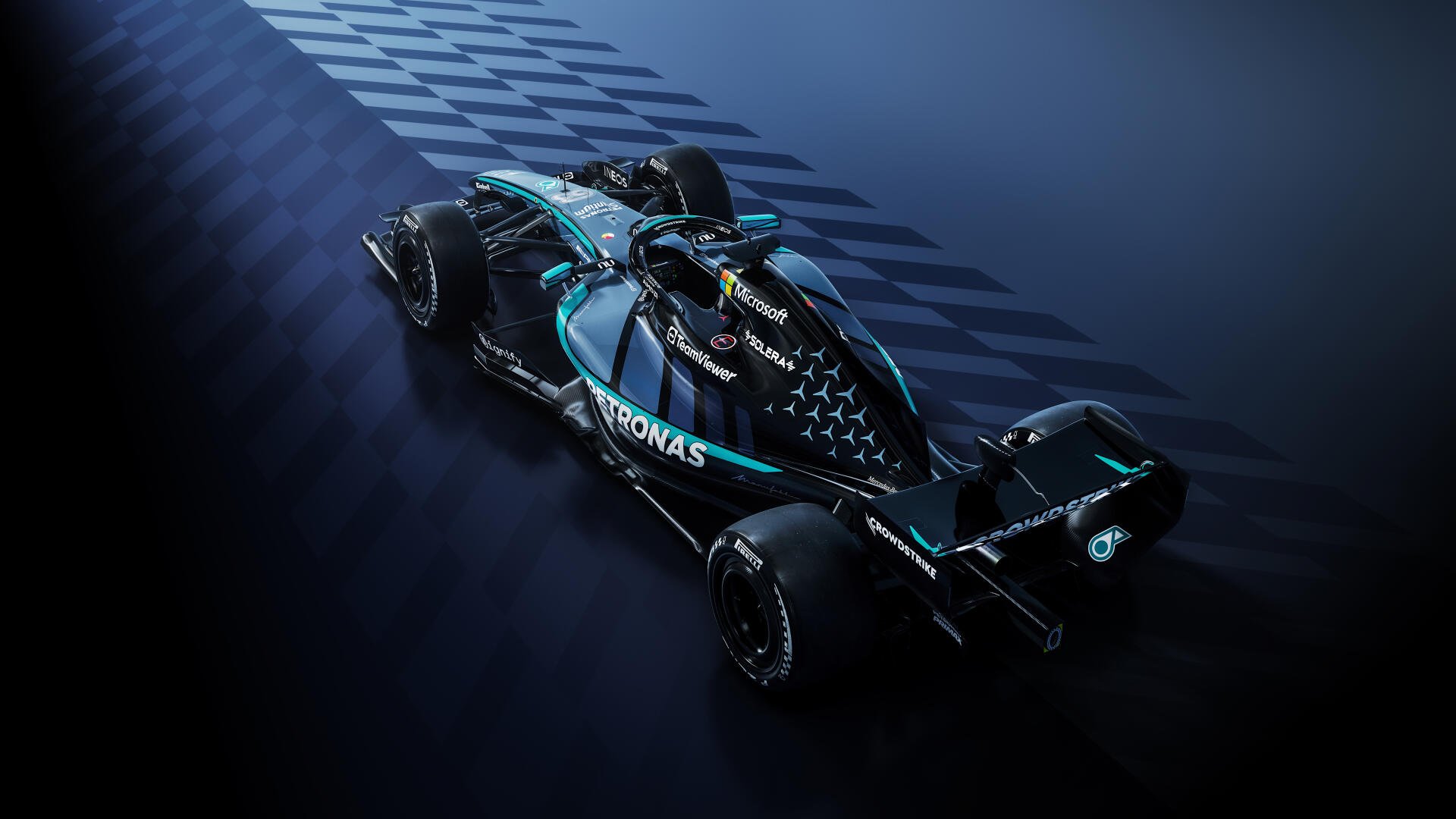 Mercedes-AMG Petronas F1 W17 race car speeding across a dark track, 4K Ultra HD desktop wallpaper.