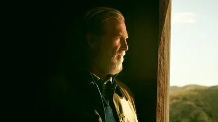 The Old Man — bearded elder in warm window light gazing at sunlit hills; 4K Ultra HD PC desktop wallpaper and background.