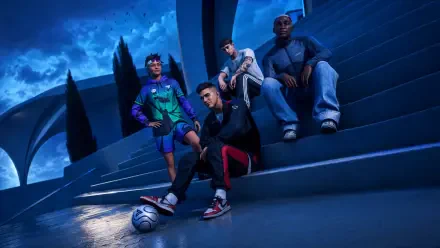 EA SPORTS FC 27 4K Ultra HD PC desktop wallpaper/background: group of four male players (men) posing with a soccer ball on moonlit steps in a stylish urban football scene.