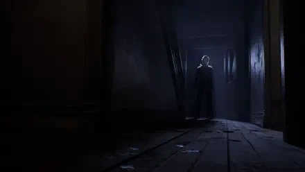 HD PC desktop wallpaper depicting Michael Myers (Halloween: The Game) silhouette standing at the end of a dark, decaying hallway.