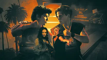 Cobra Kai HD PC desktop wallpaper: two young men face off in a martial-arts standoff, two women below, sunset-orange and black palette, palm trees and dojo signage in background.