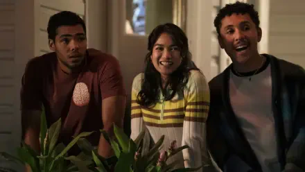 4K Ultra HD PC desktop wallpaper: three smiling people leaning over an interior railing in a warm, candid still from The Love Hypothesis.