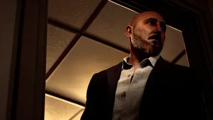Silent Hill: Townfall portrait of a bald man in a suit, moody amber-lit close-up; cinematic 4K Ultra HD PC desktop wallpaper background.
