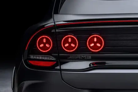 Close-up of the Mercedes-AMG GT SUV’s glowing red taillights, featured in a 2K Quad HD PC desktop wallpaper and background.