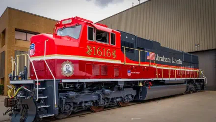 Red Union Pacific Railroad locomotive 1616 on display beside a station, featured in a high-definition train desktop wallpaper.