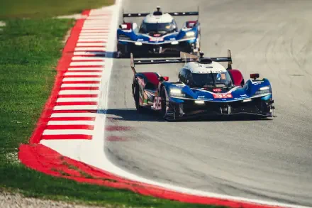 Alpine A424 race cars speeding along a race track, captured in a 5K Ultra HD desktop wallpaper.