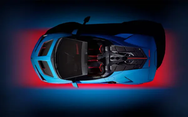 Top-down view of a blue Lamborghini Fenomeno sports car with red-accent interior and dramatic red-and-blue lighting, HD PC desktop wallpaper/background.